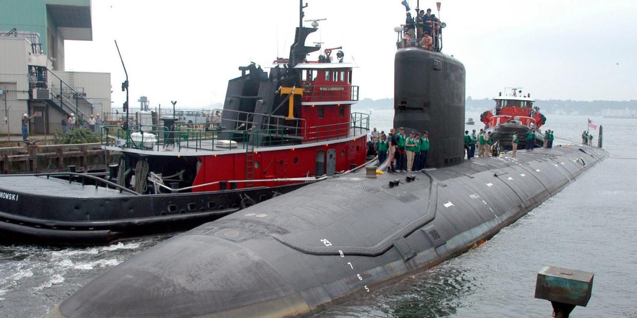 In this Friday, July 30, 2004 file photo, the U.S.S. Virginia returns to the Electric Boat Shipyard in Groton Conn., after its first sea trials.