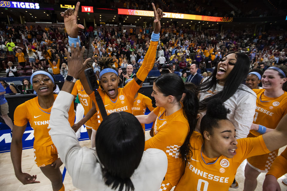 Tennessee players celebrate after upsetting LSU 69-67 to advance to the championship game in the second half of an NCAA college basketball during the Southeastern Conference women's tournament in Greenville, S.C., Saturday, March 4, 2023. (AP Photo/Mic Smith)