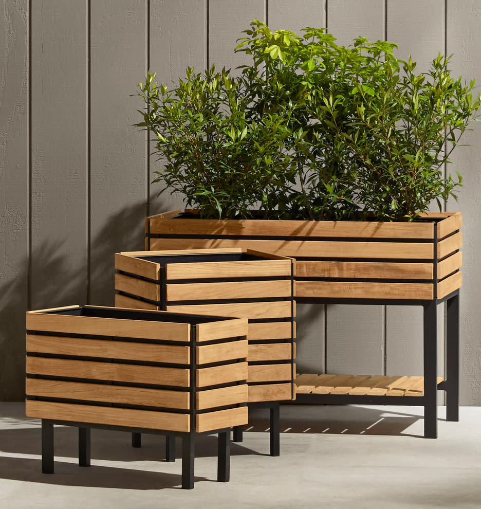 Elevate your plants with these gorgeous teak containers. (Photo: Rejuvenation)