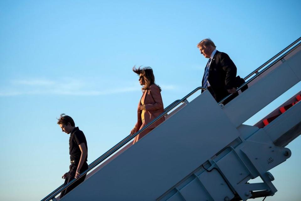 Barron, Melania and Donald Trump arriving at Palm Beach International Airport on Friday