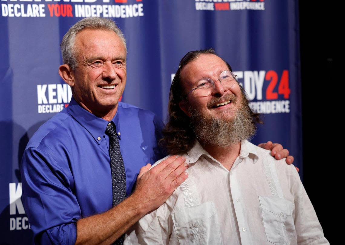 Chuck Muldoon, at right, a supporter of presidential candidate Robert F. Kennedy Jr., poses for a selfie as Kennedy Jr. hits the campaign trail to celebrate his launch of an independent run for President of the United States of America at the Adrienne Arsht Center for the Performing Arts in Miami on Thursday, October 12, 2023.