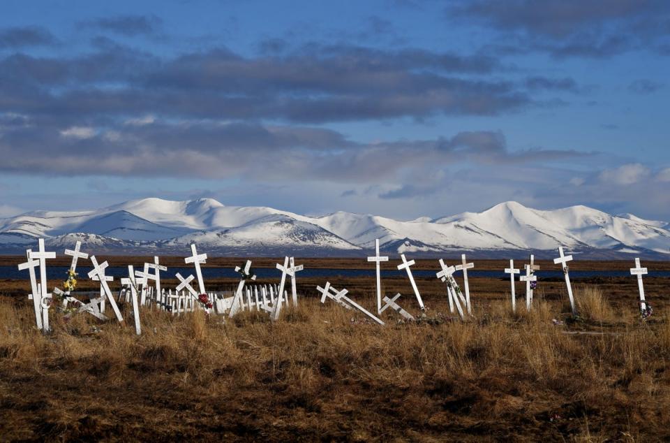 A cemetery sits on melting permafrost tundra at the Yupik Eskimo village of Quinhagak in Alaska (Mark Ralston/AFP via Getty)