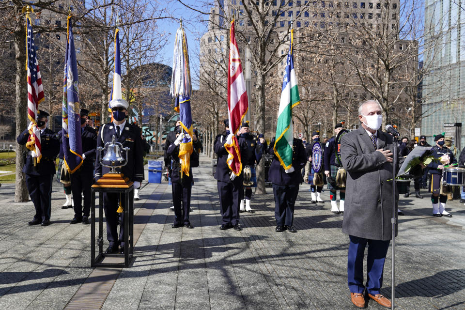 Charles Maikish, right, the former director of the World Trade Center, reads the names of the victims of the 1993 bombing of the World Trade Center during a ceremony marking the 28th anniversary of the attack, Friday, Feb. 26, 2021, in New York. On Feb. 26, 1993, a truck bomb built by Islamic extremists exploded in the parking garage of the North Tower of the World Trade Center, killing six people and injuring more than 1,000 others. (AP Photo/Mary Altaffer)