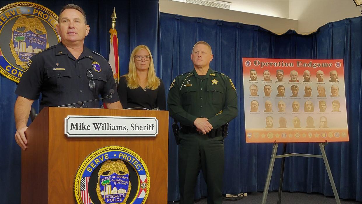 Jacksonville Sheriff Mike Williams (left) announces 26 arrests for child pornography and solicitation, joined by Assistant State Attorney Adair Newman and St. Johns County Sheriff Rob Hardwick.