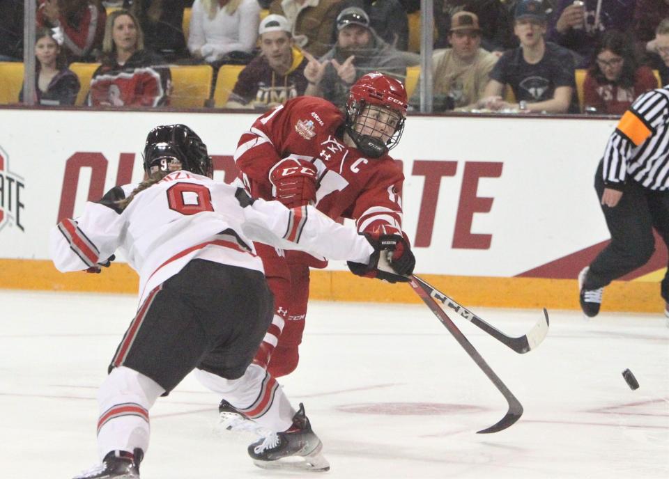 Wisconsin captain Britta Curl (17) is second on the team in scoring with 28 points (11 goals, 17 assists).