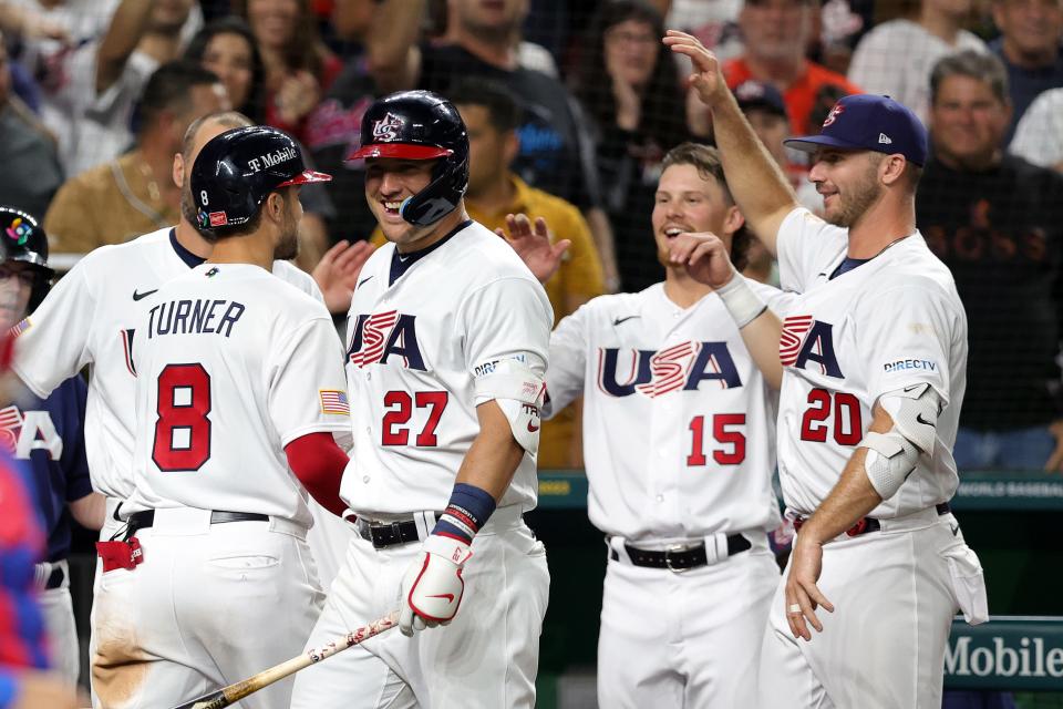 Trea Turner (8) with teammates after hitting a three-run home run in the sixth inning against Team Cuba.