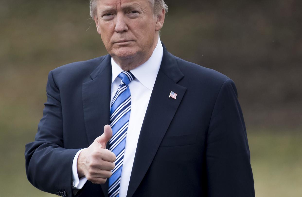 US President Donald Trump gives a thumbs-up as he walks to Marine One prior to departure from the South Lawn of the White House: SAUL LOEB/AFP/Getty Images