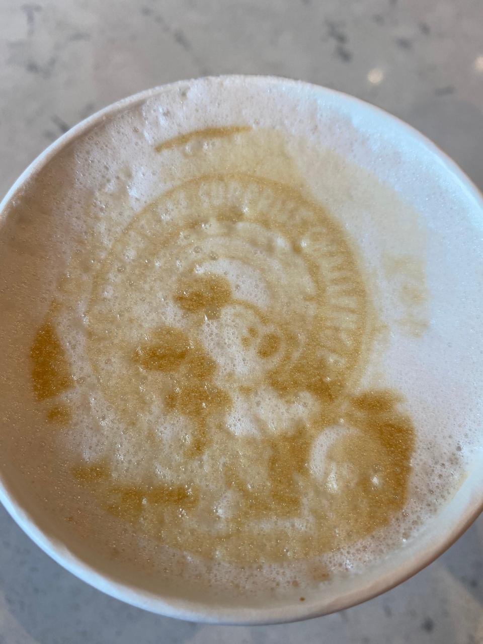 latte with disney marathon medal in latte art on top from joffrey's