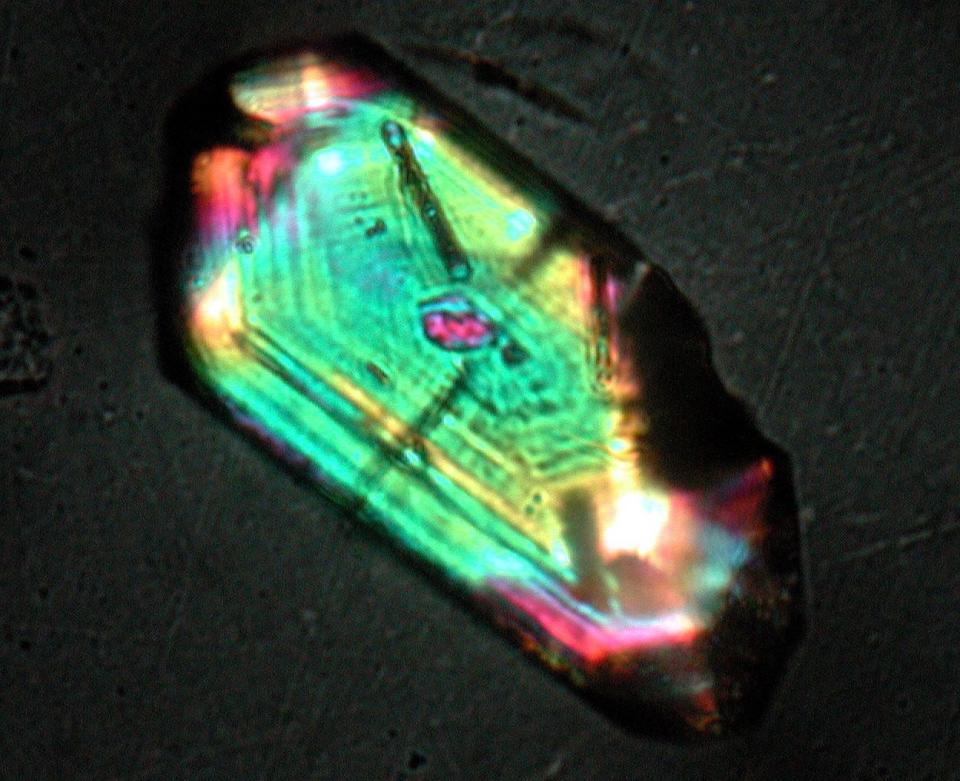 This enlarged image shows a 0.05-millimetre-long zircon that was produced by the violent impact of an ancient meteorite.