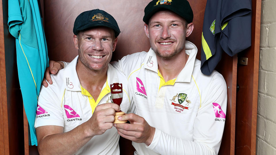 David Warner and Cameron Bancroft celebrate with the Ashes Urn in January 2018. (Photo by Ryan Pierse/Getty Images)