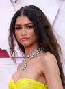 <p>Soft pink eyeshadow and rosy-toned lipstick complemented Zendaya's bold yellow Valentino Haute Couture gown, while her undone tousled waves kept the look feeling fresh. </p>