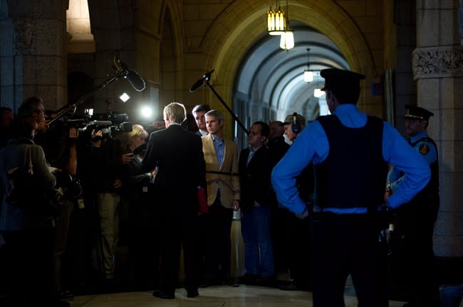 Leader of the Opposition in the Senate, Senator James Cowan speaks to media in the foyer of the Senate on Parliament Hill in Ottawa on Friday, October 25, 2013. The Conservatives in the Senate have given notice of their intent to bring the proposed suspension of three former Tories to a vote as early as Tuesday. THE CANADIAN PRESS/Sean Kilpatrick