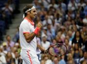 Roger Federer of Switzerland celebrates after defeating compatriot Stan Wawrinka in their men's semi-final match and advancing to the final at the U.S. Open Championships tennis tournament in New York, September 11, 2015. REUTERS/Mike Segar Picture Supplied by Action Images