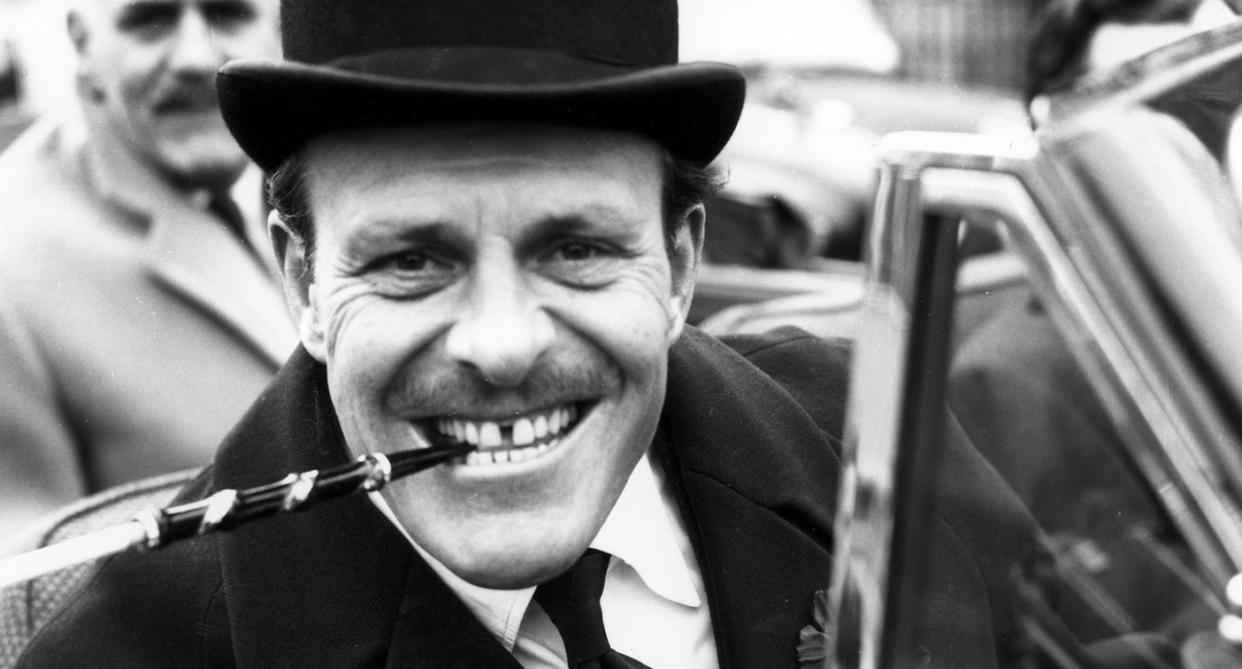 British comedian Terry Thomas arrives at court to answer a charge of driving while under the influence of alcohol, in London, March 14, 1958. (AP Photo/Eddie Worth)