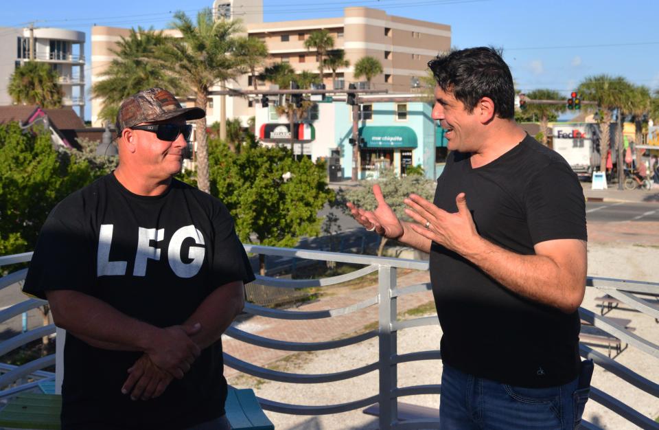 Eddie Rose, the original owner of Area 142 in Cocoa Beach, talks with new partner and co-owner James Morrone about plans to turn the space into a space-themed entertainment complex.