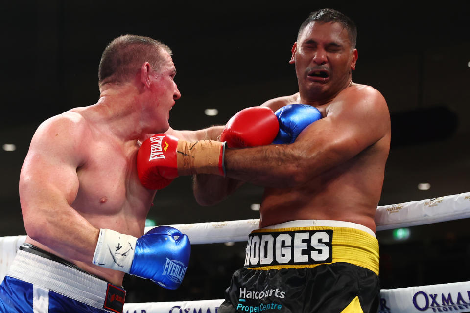 Pictured left to right, Paul Gallen punches fellow rugby league great Justin Hodges during their bout in September, 2022.