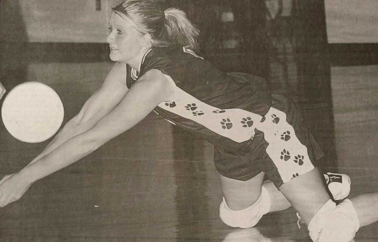 Great Plains Lutheran's Kaci Hemiller makes a dig during an Eastern Coteau Conference volleyball match against Waubay in October of 2003 in Watertown.