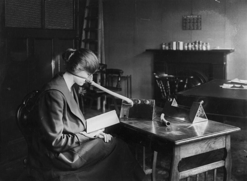 A patient wearing a flu mask during the flu epidemic which followed the First World War. (Photo by Topical Press Agency/Getty Images)