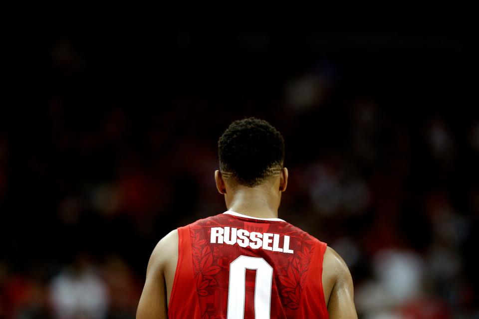 Ohio State Buckeyes guard D'Angelo Russell (0) walks away from the free throw line against Louisville Cardinals during the 2nd half of their game at KFC Yum! Center in Louisville, Ky. on December 2, 2014. (Dispatch photo by Kyle Robertson)