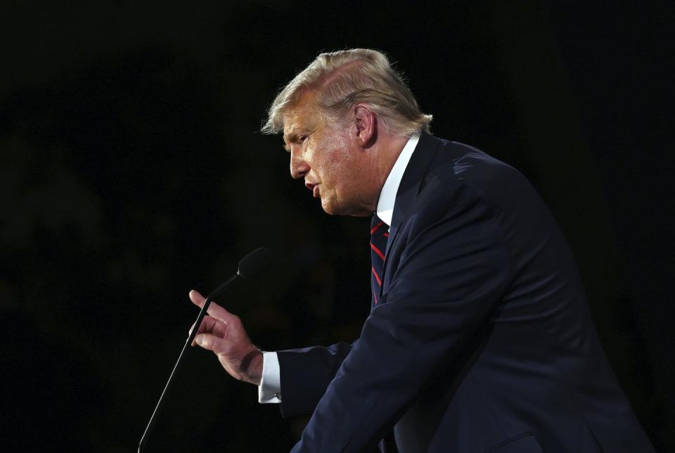 <span class="caption">President Trump during the Sept. 29, 2020 debate with Joe Biden.</span> <span class="attribution"><a class="link " href="https://newsroom.ap.org/detail/Election2020Debate/fa2aba7454a24116a7ce1d8f14dfc17c/photo?Query=Trump%20AND%20debate&mediaType=photo&sortBy=arrivaldatetime:desc&dateRange=Anytime&totalCount=3754&currentItemNo=9" rel="nofollow noopener" target="_blank" data-ylk="slk:Olivier Douliery/Pool via AP;elm:context_link;itc:0;sec:content-canvas">Olivier Douliery/Pool via AP</a></span>