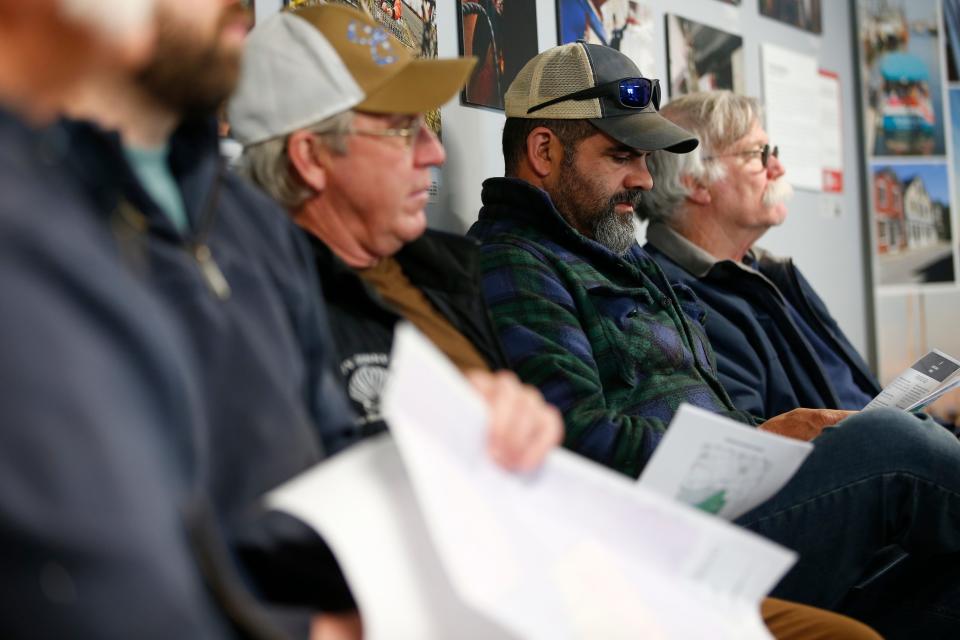 New Bedford fishermen attend an event held at the New Bedford Port Authority building in New Bedford where fishermen could enroll in the Vineyard Wind Fisheries Compensation Program.