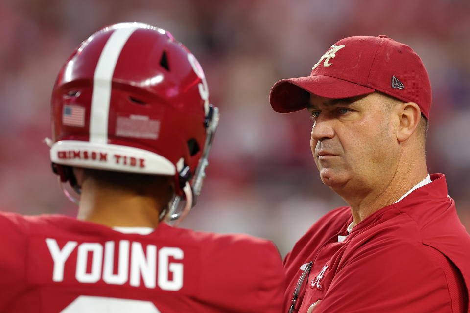 TUSCALOOSA, ALABAMA - OCTOBER 08:  Offensive coordinator Bill O'Brien converses with Bryce Young #9 of the Alabama Crimson Tide during pregame warmups prior to facing the Texas A&M Aggies at Bryant-Denny Stadium on October 08, 2022 in Tuscaloosa, Alabama. (Photo by Kevin C. Cox/Getty Images)