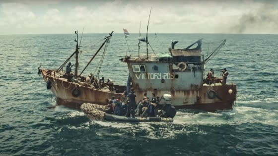 In August 2019, The Outlaw Ocean Project team inspects a Chinese fishing vessel off the coast of West Africa. <span class="copyright"> Fábio Nascimento for The Outlaw Ocean Project</span>