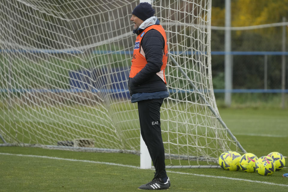 Napoli coach Luciano Spalletti wears a bib reading: " I will be with you and you don't have to give up" during a training session at the club headquarters in Castel Volturno, near Naples, Wednesday, April 5, 2023.Unlike other major cities in Italy, Naples has only one major soccer team and the fan support for Napoli is felt on every street and alleyway. Lobotka, who developed with Ajax’s junior squad and then played for Danish club Nordsjaelland and Spanish side Celta Vigo before transferring to Italy, had never experienced anything like Napoli. (AP Photo/Gregorio Borgia)