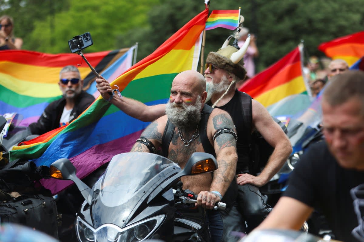 The parade began at 12pm with thousands of people watching (Reuters)