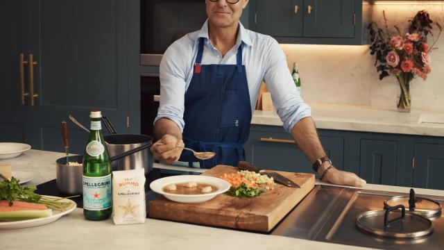 Premium Photo  Man in apron making spaghetti with noodle cutter