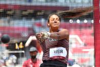 <p>Canada's Jillian Weir competes in the women's hammer throw qualification during the Tokyo 2020 Olympic Games at the Olympic Stadium in Tokyo on August 1, 2021. (Photo by Andrej ISAKOVIC / AFP)</p> 