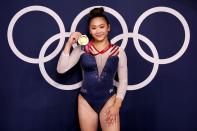 <p>Speaking with reporters after the event, Lee said that she <a href="https://people.com/sports/tokyo-olympics-sunisa-lee-didnt-think-she-could-win-gold-gymnastics-all-around/" rel="nofollow noopener" target="_blank" data-ylk="slk:could not believe what she had achieved;elm:context_link;itc:0;sec:content-canvas" class="link ">could not believe what she had achieved</a>.</p> <p>"Coming into this competition, I didn't even think that I could be competing for a gold medal," she said. "I was coming to compete for a silver medal. To be here, it's crazy."</p>