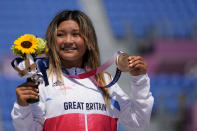 FILE - Sky Brown of Britain poses with her bronze medal in the women's park skateboarding at the 2020 Summer Olympics, Wednesday, Aug. 4, 2021, in Tokyo, Japan. (AP Photo/Ben Curtis, File)