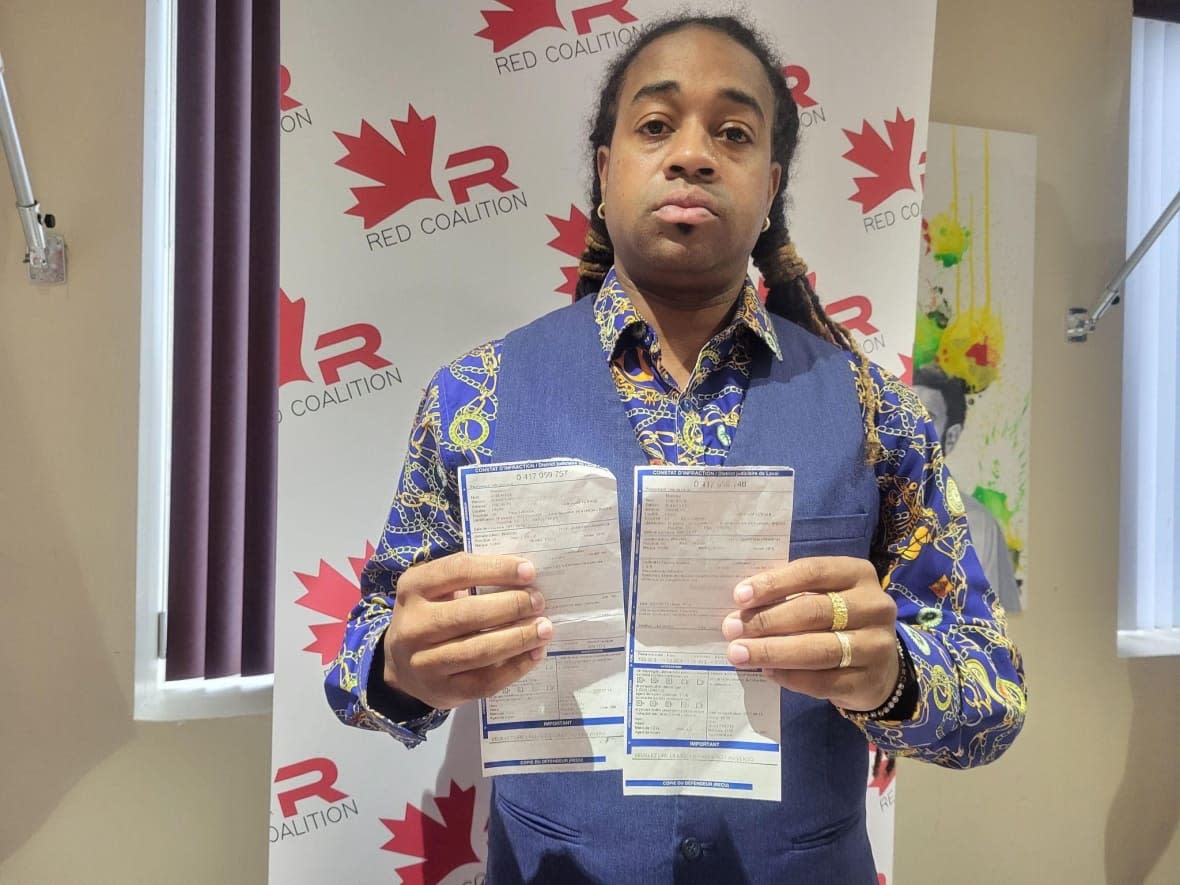 Carl Luberisse says he was pulled over for no reason and given two unwarranted tickets outside his workplace, which led his employer to fire him. (Kwabena Oduro/CBC - image credit)