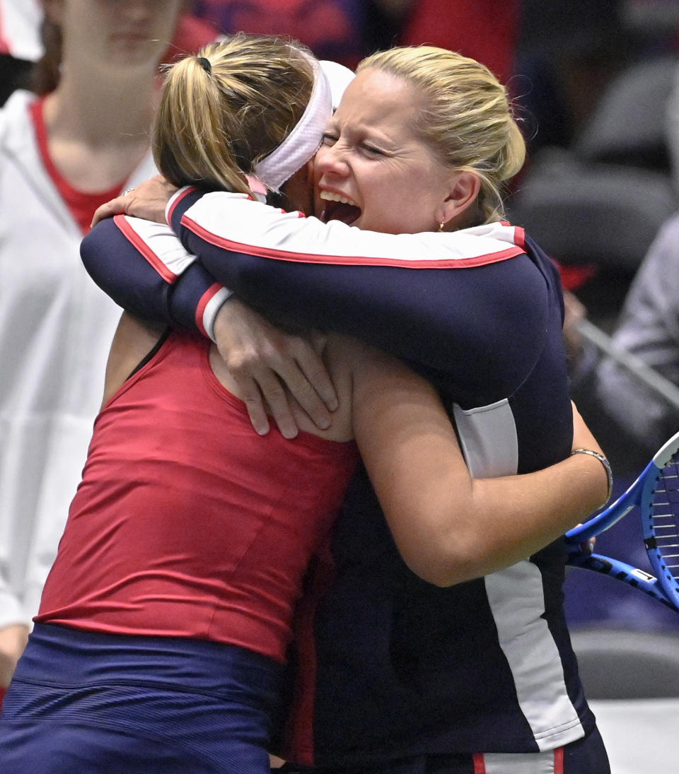 United States captain Kathy Rinaldi, right, hugs player Sofia Kenin after her win against Switzerland's Timea Bacsinszky, after their playoff-round Fed Cup tennis match, Sunday, April 21, 2019, in San Antonio. (AP Photo/Darren Abate)