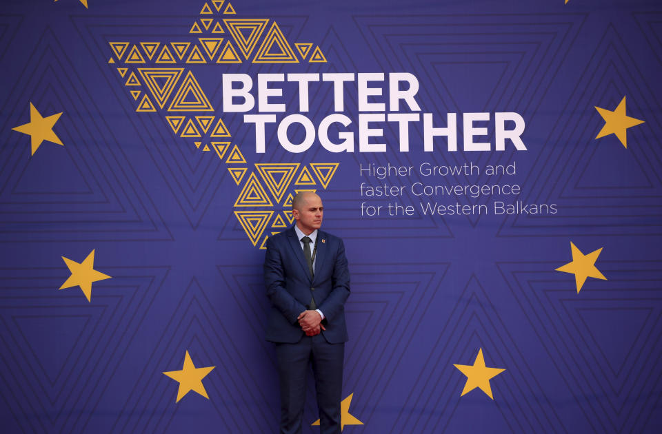 A member of security personnel stands outside the summit in Tirana, Albania, Thursday, Feb. 29, 2024. The leaders of Western Balkan countries met Thursday in another joint push to use the European Union's financial support plan of six billion euros (about $6.5 billion) hoping it will speed up its membership in the bloc. (AP Photo/Armando Babani)