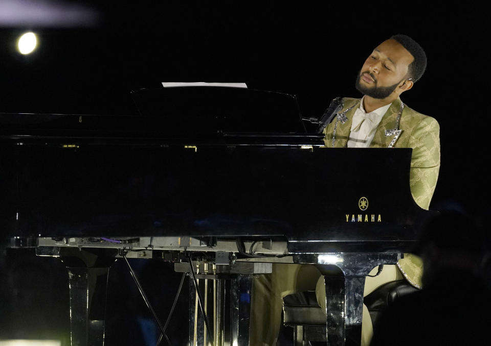 John Legend performs "River" at the 31st annual MusiCares Person of the Year benefit gala honoring Joni Mitchell on Friday, April 1, 2022, at the MGM Grand Conference Center in Las Vegas. (AP Photo/Chris Pizzello)