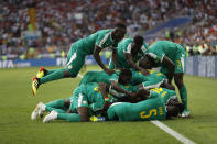 <p>Mbaye Niang celebrates with his teammates after scoring Senegal’s second goal </p>