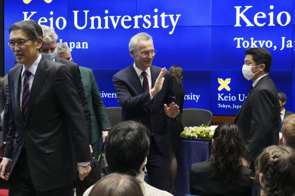 NATO Secretary-General Jens Stoltenberg, center, leaves the venue after meeting with students at Keio University in Tokyo, Wednesday, Feb. 1, 2023. (AP Photo/Eugene Hoshiko)