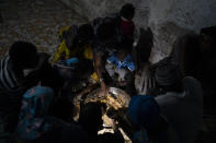 Ndeye Yacine Dieng breaks the fast with her family during the holy month of Ramadan at her home in Bargny, Senegal some 35 kilometers (22 miles) east of Dakar, Senegal, Wednesday April 21, 2021. (AP Photo/Leo Correa)