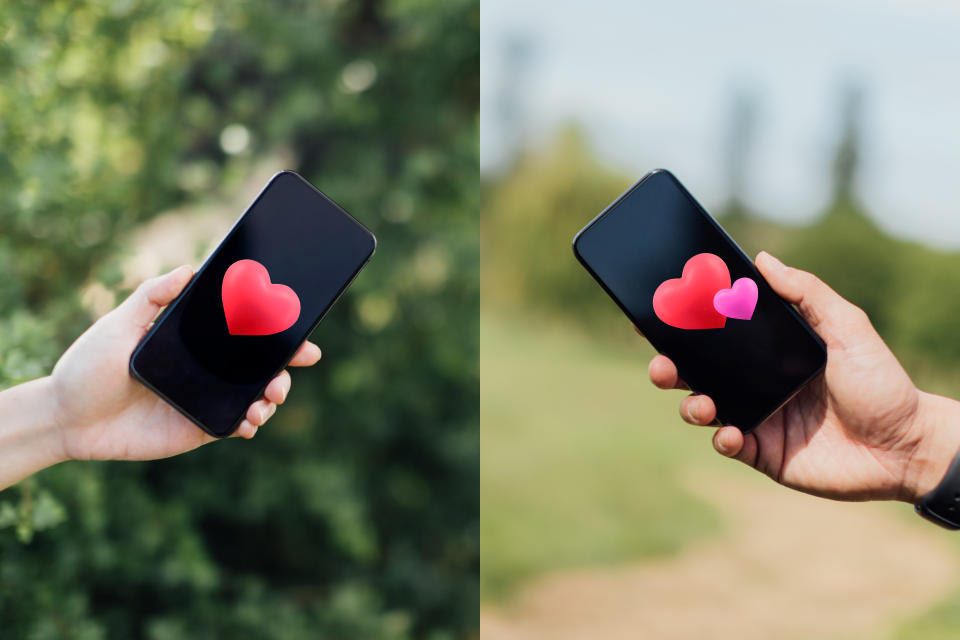 Two human hands holding two smartphones with a heart graphics on the screen in different places.
