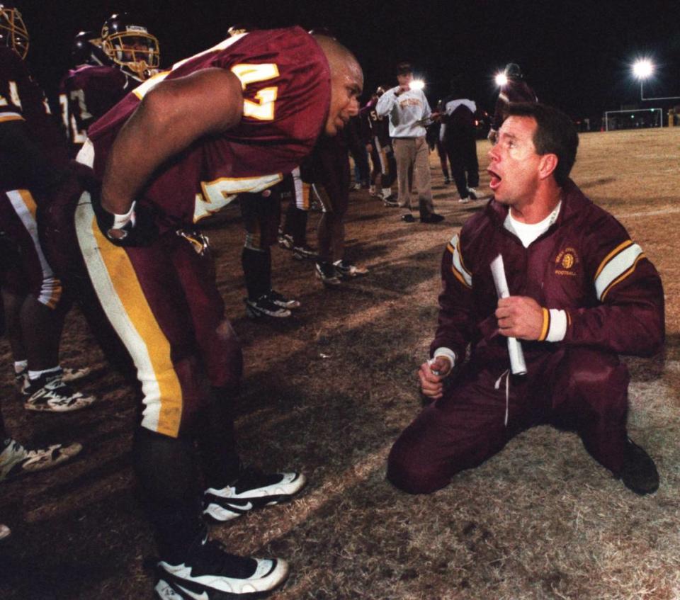 12/05/95 1B Photos by GARY O’BRIEN/Staff West Charlotte football coach Tom Knotts is leading a program he says parents want to send their children into. ``People know we’ll be wide open,’’ Knotts says, ``and that we’ll have guys going to Division I colleges.’’ (UNPUBLISHED NOTES:) (12/1/95 WERTZ)Head coach Tom Knotts exhorts Amos Hall to greater effort while the Lions were leading 8-0 over Crest. GARY O’BRIEN/STAFF