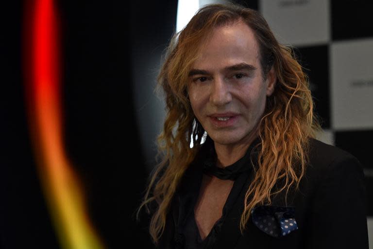 British designer John Galliano gives a press conference at the Barvikha Luxury Village Concert Hall just outside Moscow, Russia, on May 22, 2014