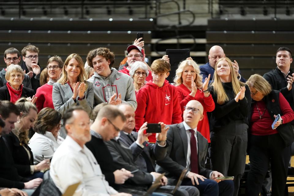 Jan 17, 2024; Columbus, OH, USA; The family of Ross Bjork stands as he’s introduced as the university’s new athletic director during a press conference at the Covelli Center.