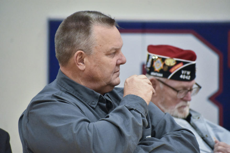 Sen. Jon Tester, D-Mont., listens to a speaker during a Veterans Day event at Bigfork High School, on Nov. 10, 2023, in Bigfork, Mont. Tester, a Democrat, is seeking re-election to a fourth term. (AP Photo/Matthew Brown)