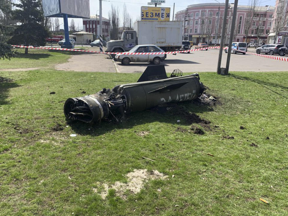 The remains of a rocket lie on an area of grass, after a rocket attack on the railway station in the eastern city of Kramatorsk, in the Donbass region on April 8, 2022. - More than 30 people were killed and over 100 injured in a rocket attack on a train station in Kramatorsk in eastern Ukraine, the head of the national railway company said. (Photo by Hervé BAR / AFP) (Photo by HERVE BAR/AFP via Getty Images)