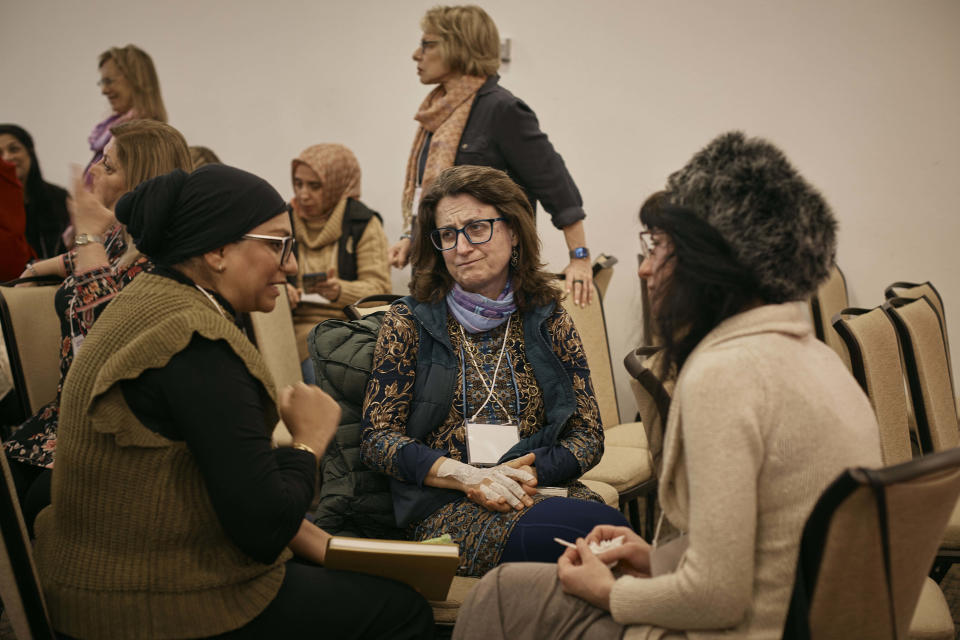 Muslim and Jewish women chat as they gather during an interfaith workshop on the Israeli-Palestinian conflict at Rutgers University on Sunday, Nov. 19, 2023, in New Brunswick, N.J. The latest violence, triggered by the Oct. 7 Hamas attack on Israel, is prompting some to question such dialogue, its role, impact -- or how to even have it-- while steeling the resolve of others to connect and wrestle together with the challenges. (AP Photo/Andres Kudacki)