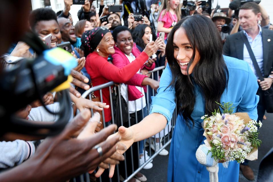 Meghan and Harry also greeted well-wishers gathered outside the District Six Museum.