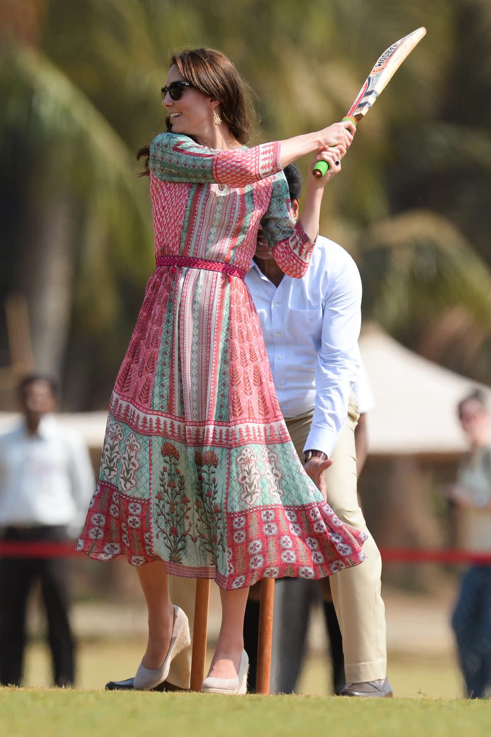 <p><em>April 10, 2016 —</em> The future queen showed off her cricket skills at Mumbai's recreation ground, the Oval Maidan, wearing a dress by Anita Dongre, a popular Indian designer, and <a href="https://www.nordstromrack.com/shop/product/3031575?color=CAMEL%20NUBK" rel="nofollow noopener" target="_blank" data-ylk="slk:beige wedges;elm:context_link;itc:0;sec:content-canvas" class="link ">beige wedges</a>.</p>