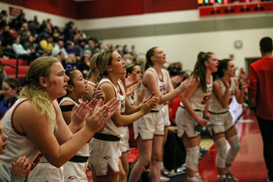 DCG players cheer on their teammates during a game against Indianola on Friday, Jan. 6, 2023, in Grimes.